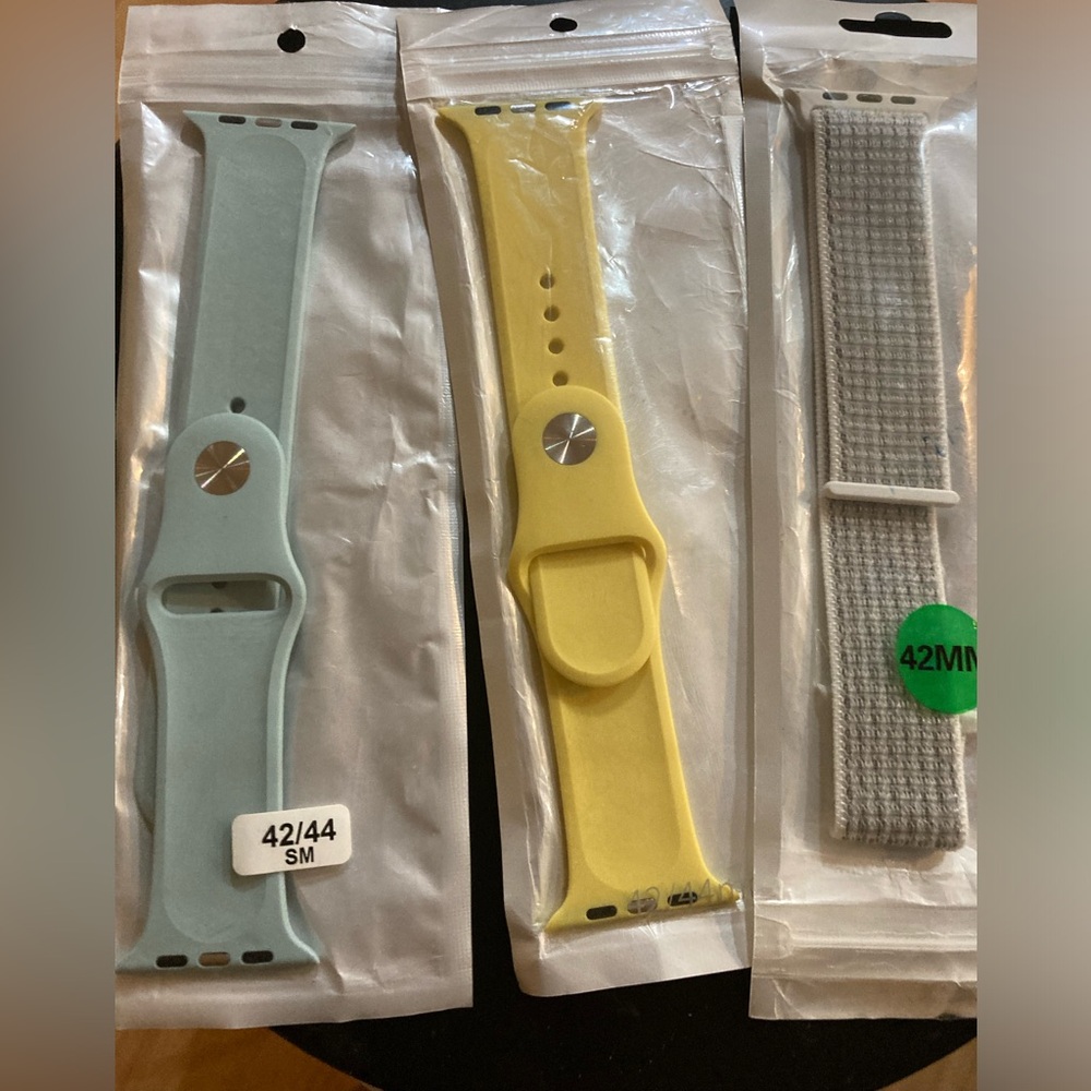 THREE 42 MM Apple Watch wrist bands. Three different colors to choose from